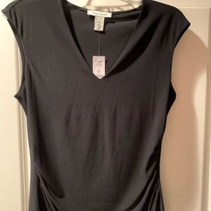 Black knit sleeveless top.